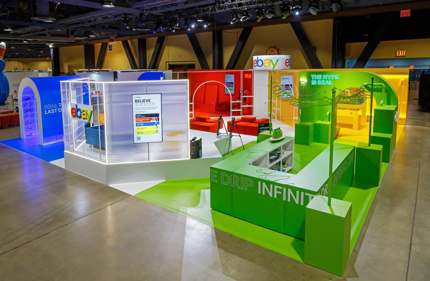 The eBay House overall — color-blocked rooms around eBay-red modular seating
