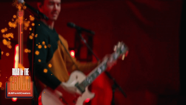 A hashtag firing the Roar of the Crowd effect on stage