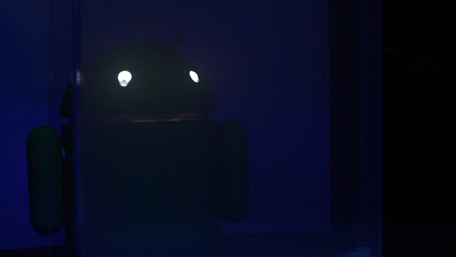 The Android robot glowing in the dark