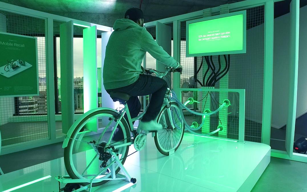 An executive on the connected bike, pedaling against page weight
