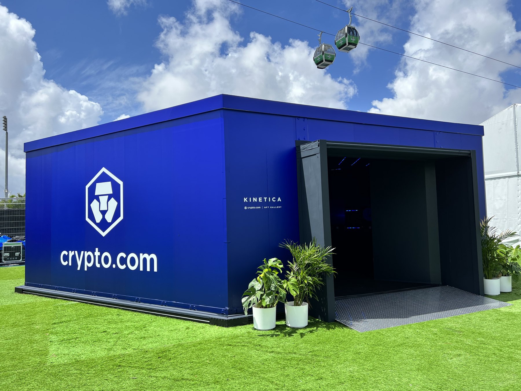 The pavilion in Crypto.com blue, gondolas overhead