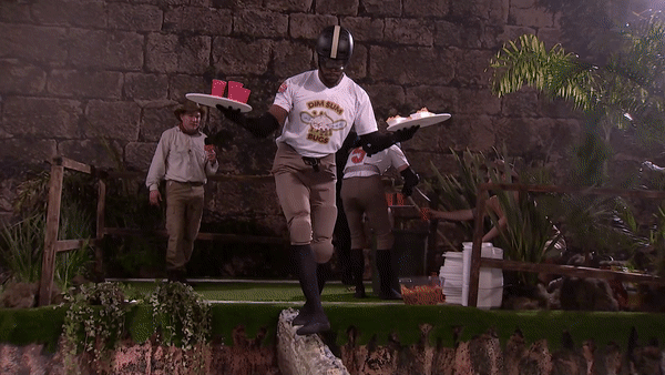 A contestant charging the foam obstacle course